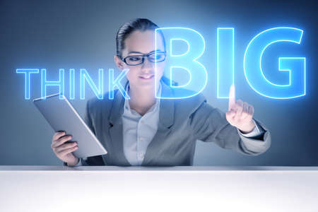 Think big concept with businesswomanの写真素材
