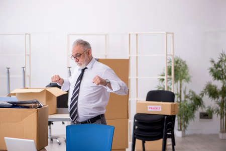 Old male employee in relocation concept