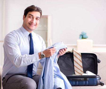 Businessman preparing for the business tripの写真素材