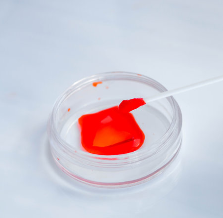 Young doctor working on blood test in lab hospitalの写真素材