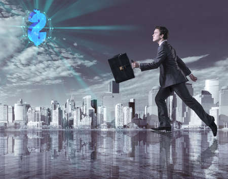 Businessman walking on the water towards dollarの写真素材