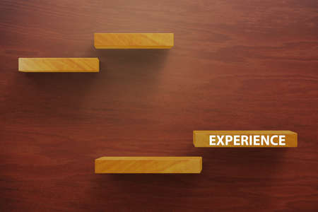 Experience business concept with steps going upの写真素材