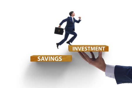 Concept of savings and investment with businessmanの写真素材