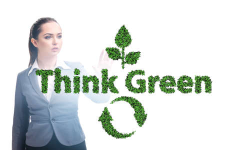 Think green ecological concept with businesswomanの写真素材