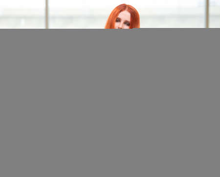 Young woman moving house in lifestyle conceptの写真素材