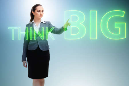Think big concept with businesswomanの写真素材
