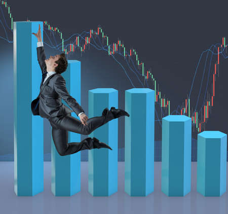 Businessman jumping in business conceptの写真素材