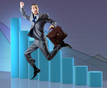 Businessman jumping in business conceptの写真素材