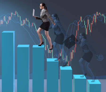 Businesswoman climbing career ladder as trader brokerの写真素材
