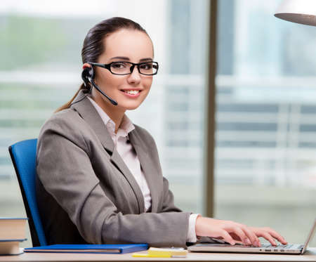 Call center operator working at her desk
