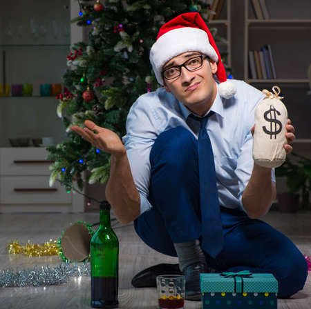 Businessman celebrating christmas at home aloneの写真素材