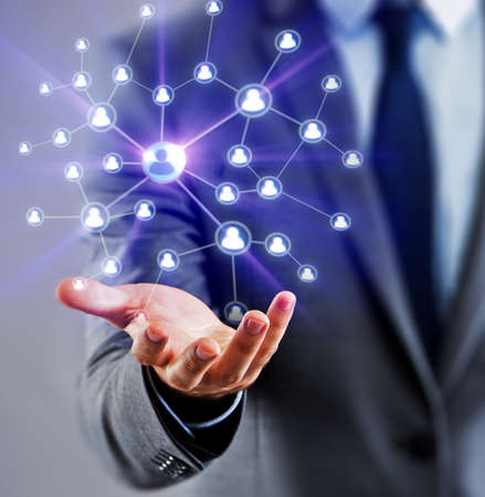 Businessman in social networks conceptの写真素材