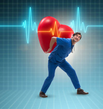 Man doctor in cardiology telemedicine conceptの写真素材