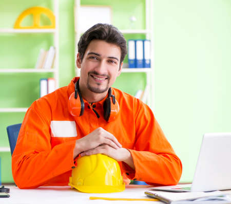Construction supervisor planning new project in office