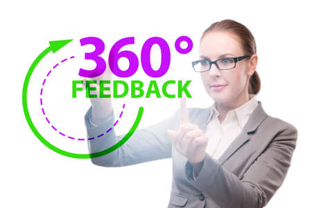 360 degree concept with businesswoman pressing buttonの写真素材