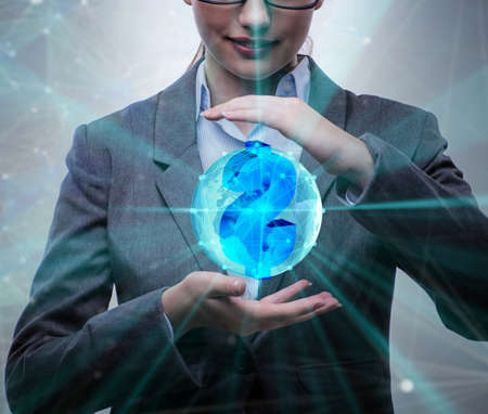 Businesswoman with dollars in business conceptの写真素材