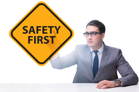 Safety first concept with businessmanの写真素材