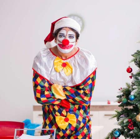 Funny clown in Christmas celebration concept