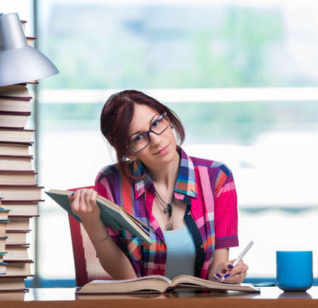 Young female student preparing for examsの写真素材