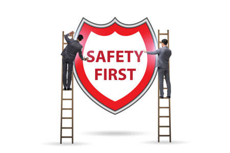 Safety first concept with businessmanの写真素材