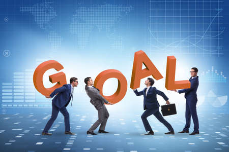 Businessman in goal concept carrying lettersの写真素材