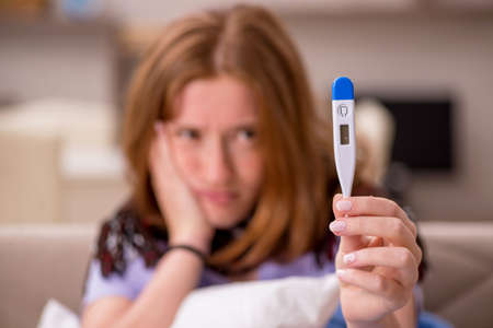 Young woman suffering at home