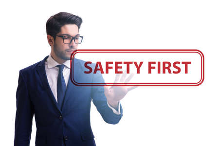 Safety first concept with businessman
