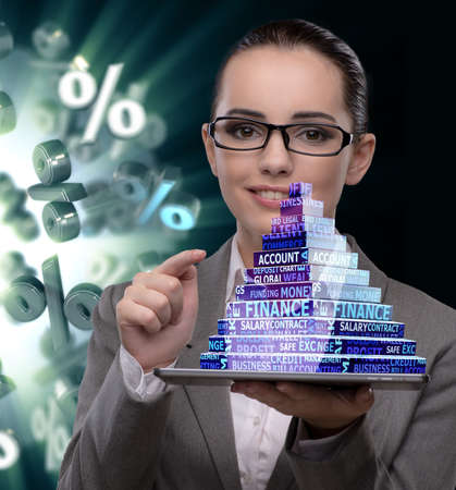 Businesswoman with dollars in business conceptの写真素材