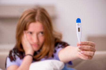 Young woman suffering at home