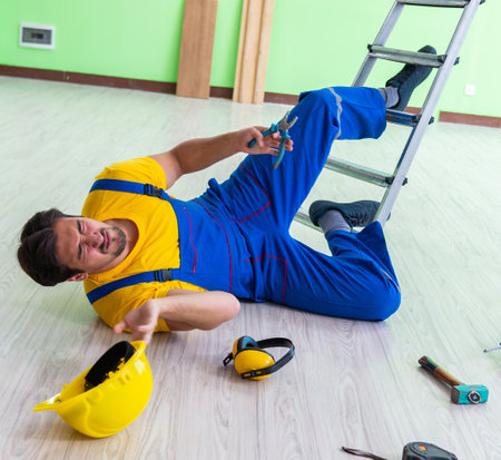 Injured worker at the work siteの写真素材