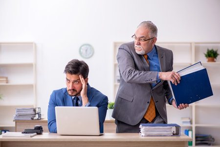 Two colleagues working in the officeの写真素材