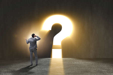 Concept of uncertainty with question and businessmanの写真素材