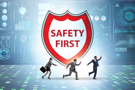Safety first badge with business people