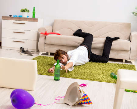 The young man having hangover after party