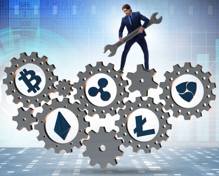 The businessman in cryptocurrency concept with spanner