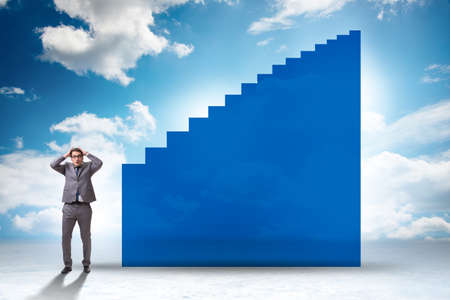 Career ladder concept with the businessmanの写真素材