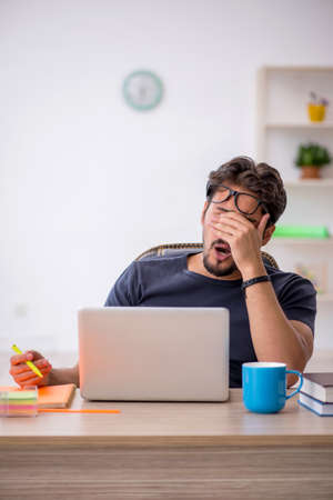 Young male designer working in the officeの写真素材