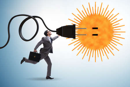 Businessman in solar energy concept