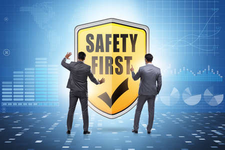 Safety first concept with businessmanの写真素材