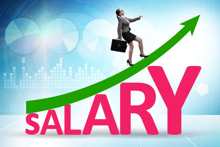 Salary increase concept with businesswomanの写真素材