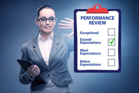 Annual performance review concept with businesswomanの写真素材