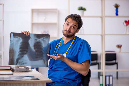 Young male doctor radiologist working in the clinic