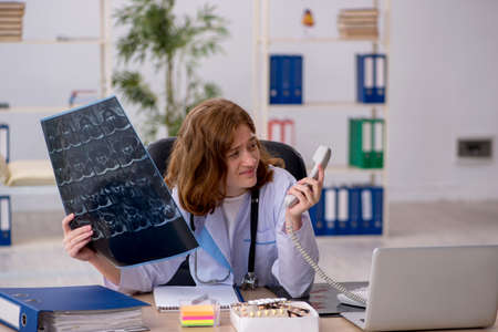 Young female doctor radiologist workiing in the clinic