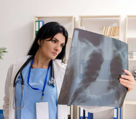 The female doctor radiologist working in the clinic