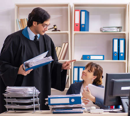 Two lawyers working in the officeの写真素材