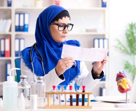 Female doctor in hijab working in the hospitalの写真素材