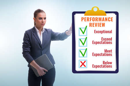 Annual performance review concept with businesswomanの写真素材