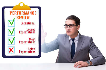 Annual performance review concept with businessmanの写真素材