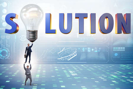 Concept of soluton with businessman and lightbulbの写真素材