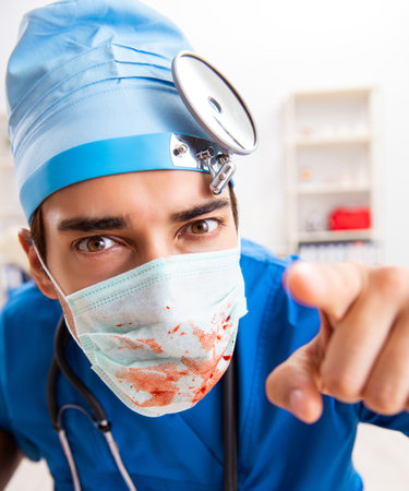 Mad doctor working in the clinicの写真素材